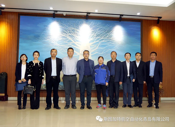 中国人民银行青岛中心支行张文武行长一行莅临IM电竞考察调研